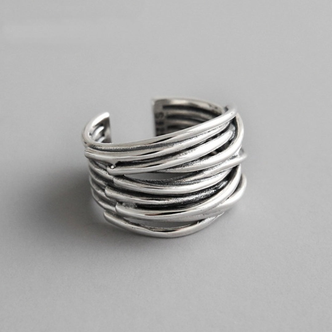 Anillo ajustable de plata con capas